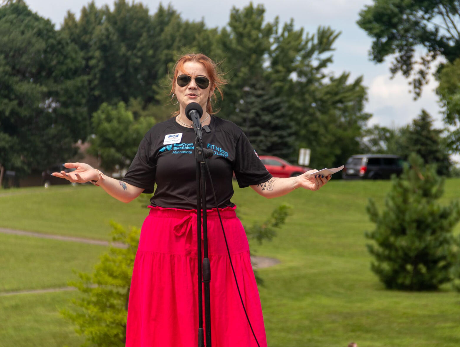 A woman speaking into a microphone
